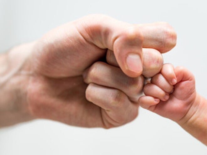 Manos de papá e hijo Manos de papá e hijo